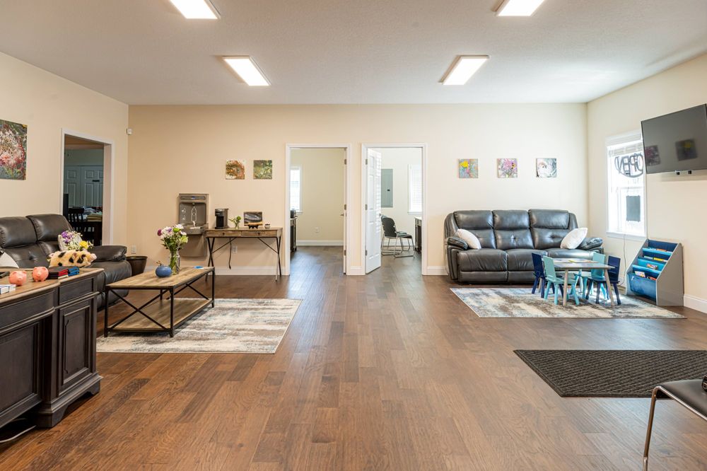 Peterson Insurance Group office lobby with comfortable seating, kids corner, and welcoming atmosphere
